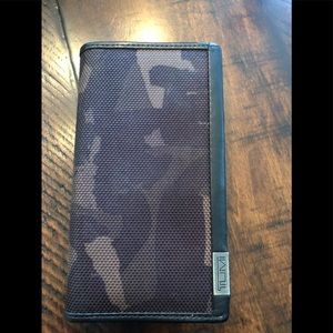 Men’s Tumi bi fold wallet
